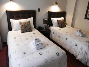 Blub Hotel Spa客房内的一张或多张床位
