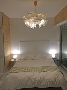 Postel nebo postele na pokoji v ubytování Superbe appartement sur la plage - Le Zénith