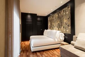 Claris Hotel & Spa GL, a Small Luxury Hotel of the World的休息区