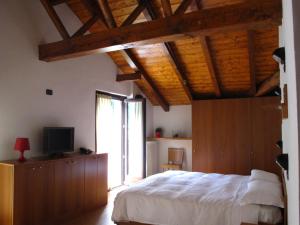 Postel nebo postele na pokoji v ubytování Casa Alpina Don Guanella