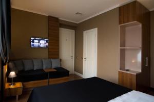 Postel nebo postele na pokoji v ubytování B&B Wimbledon Garni Concept