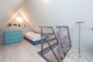 Posteľ alebo postele v izbe v ubytovaní Old Town Panorama Apartments