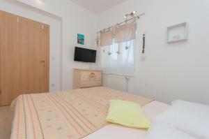 Posteľ alebo postele v izbe v ubytovaní Apartment Lelas