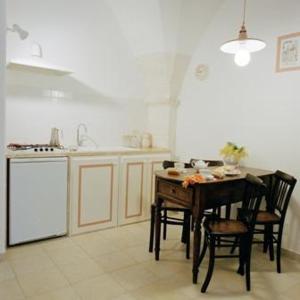 Kuchyň nebo kuchyňský kout v ubytování Villaggio In Case Sparse Nel Centro Storico