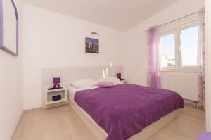 Posteľ alebo postele v izbe v ubytovaní Apartment Lelas