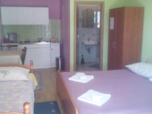 Postel nebo postele na pokoji v ubytování Apartments Bogunovic
