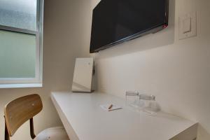 TV a/nebo společenská místnost v ubytování Hotel Hive