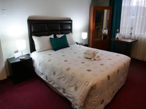Blub Hotel Spa客房内的一张或多张床位