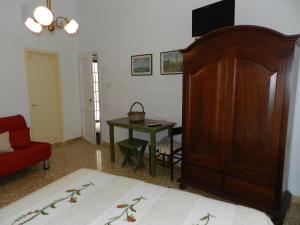 TV a/nebo společenská místnost v ubytování Casa Corte con Terrazza