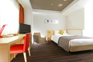 Postel nebo postele na pokoji v ubytování HOTEL MYSTAYS Utsunomiya