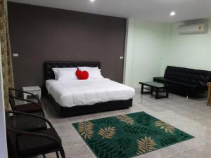 Кровать или кровати в номере Pingpong's House Koh Chang