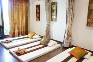 Un pat sau paturi într-o cameră la Oasis Garden & Pool Villa at VIP Resort +52 fotografii