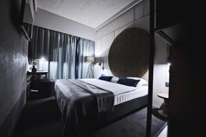 Łóżko lub łóżka w pokoju w obiekcie Hotel Remes