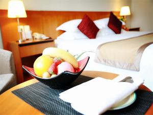 Postel nebo postele na pokoji v ubytování Jinglun Hotel Beijing