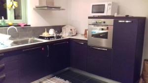 Kuchyňa alebo kuchynka v ubytovaní Arvé Castelbianco - B&B e Appartamento