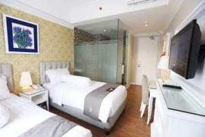 Μια τηλεόραση ή/και κέντρο ψυχαγωγίας στο F Hotel Jakarta