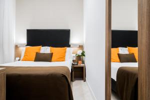 Letto o letti in una camera di Hotel Concordia