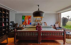 a bedroom with a large bed and a large window at The Park Visakhapatnam in Visakhapatnam