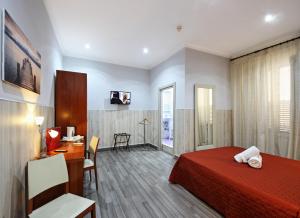 Łóżko lub łóżka w pokoju w obiekcie Hotel Tonic