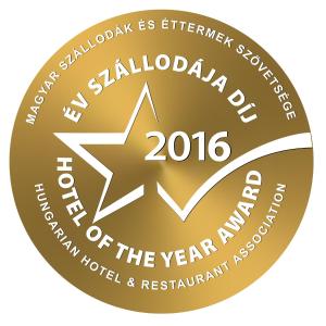 a gold medal with the words new salimov society of the year at Three Corners Hotel Art in Budapest