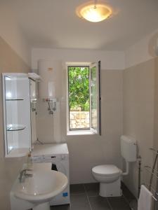 Kúpeľňa v ubytovaní Apartments Maržić