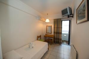 Postel nebo postele na pokoji v ubytování International Hotel