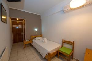 Postel nebo postele na pokoji v ubytování International Hotel