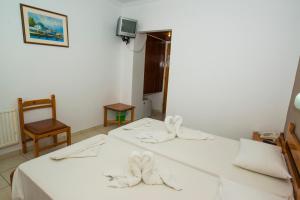 Postel nebo postele na pokoji v ubytování International Hotel