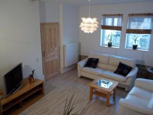 Μια τηλεόραση ή/και κέντρο ψυχαγωγίας στο Ferienhaus Schock