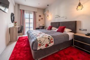 Postel nebo postele na pokoji v ubytování Filoxenia Hotel & Spa