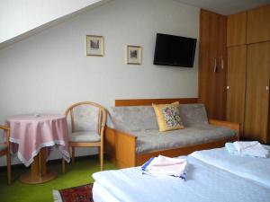 Postel nebo postele na pokoji v ubytování Hotel Rosner