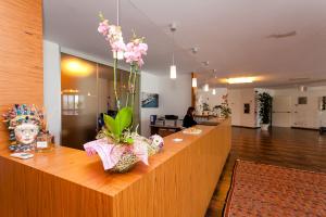 En TV eller et underholdningssystem på Hotel Scialì