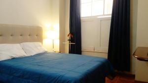Postel nebo postele na pokoji v ubytování Hotel Náutico de Paita