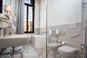 Kúpeľňa v ubytovaní Hotel Ca' Nobile Corner