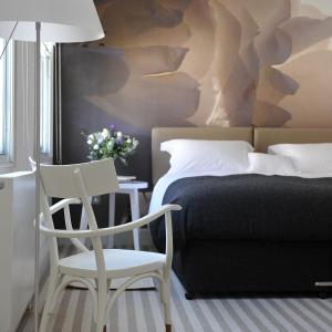 A bed or beds in a room at The Crown Hotel 