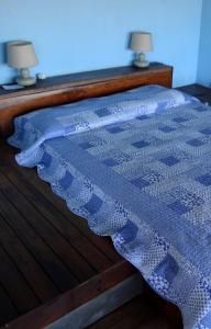 Postel nebo postele na pokoji v ubytování La Posada