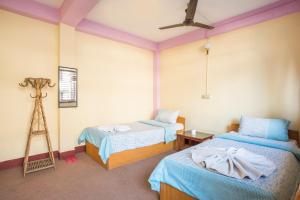 Ένα ή περισσότερα κρεβάτια σε δωμάτιο στο Hotel Yala Peak