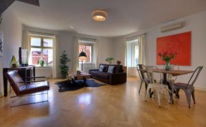Posedenie v ubytovaní U Kapra Apartments