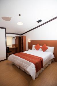 Cama ou camas em um quarto em Royal Inka II