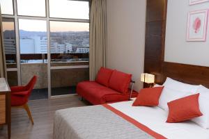 Postel nebo postele na pokoji v ubytování Caesar Premier Eilat Hotel