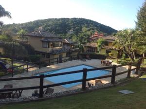 Piscina de la sau aproape de Suite Em Buzios JoãO Fernandes Praia