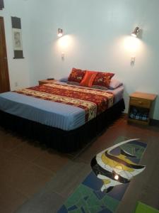 Un pat sau paturi într-o cameră la Gecko Lodge Fiji