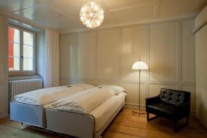 Postel nebo postele na pokoji v ubytování Hotel Restaurant Schwert Thun