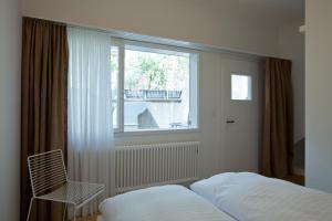 Postel nebo postele na pokoji v ubytování Hotel Restaurant Schwert Thun
