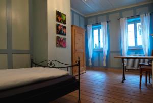 Postel nebo postele na pokoji v ubytování Hotel Restaurant Schwert Thun