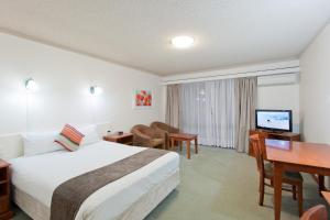 เตียงในห้องที่ Admiral Motel Bunbury