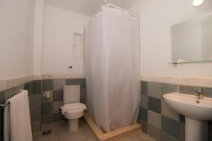 Koupelna v ubytování Hapi Hotel