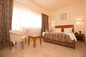 Postel nebo postele na pokoji v ubytování Hapi Hotel