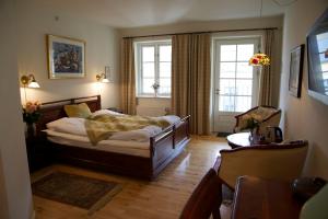 Postel nebo postele na pokoji v ubytování Hotel Ærø