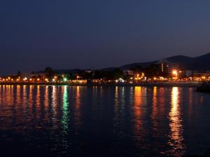 a view of the water at night at Marathon Eco Stay in Marathon